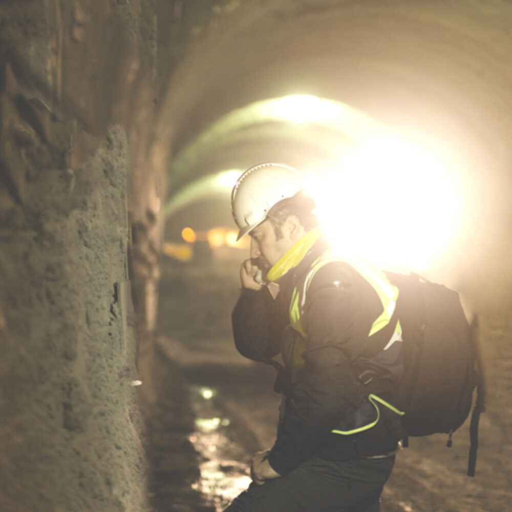 Man in mining tunnel using Strataconnect